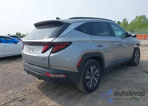 2024 Hyundai Tucson Hybrid Blue z USA, uszkodzony, nr VIN KM8JBCD13RU207860